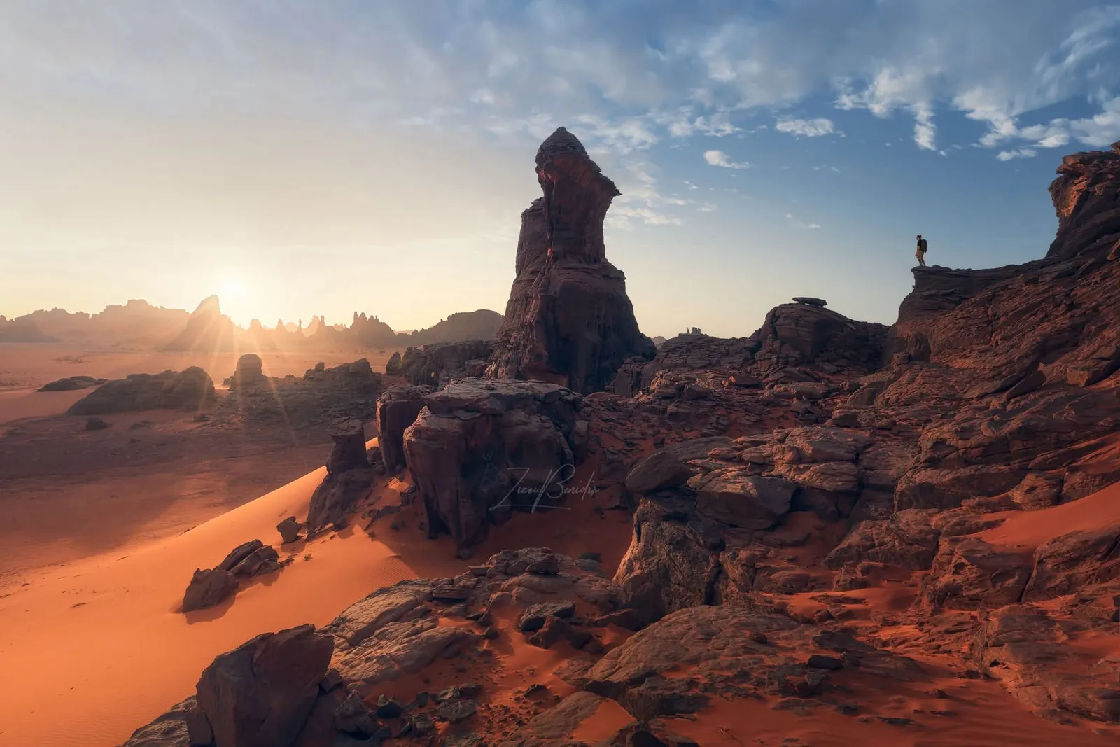 Sunset over the red rocks of the Tadrart Rouge